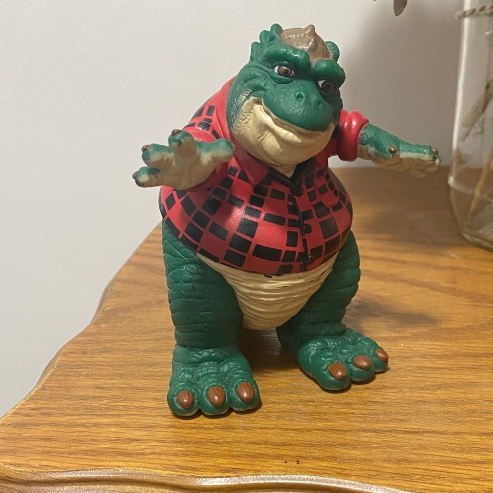 Green and Red Dinosaur Figurine